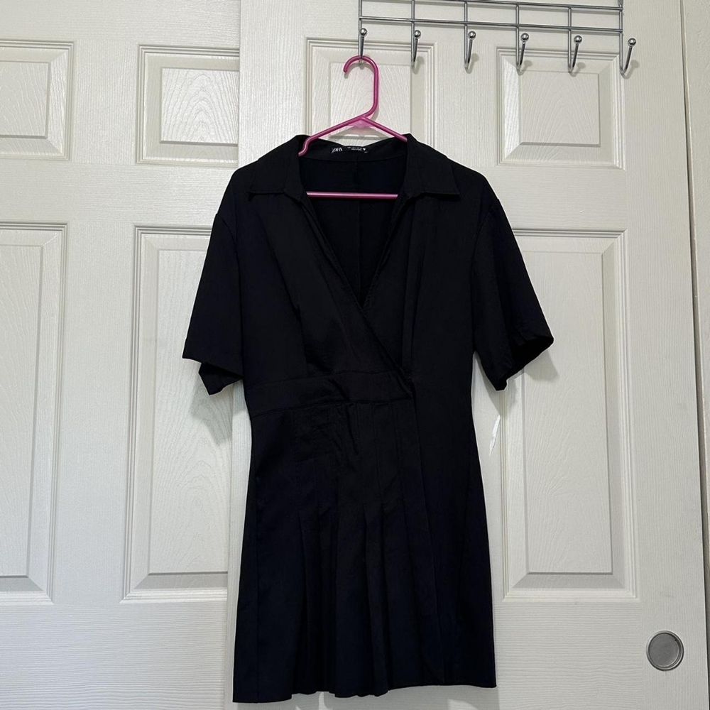 Black pleated mini dress